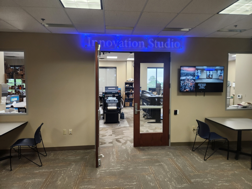 Innovation Studio sign and open door